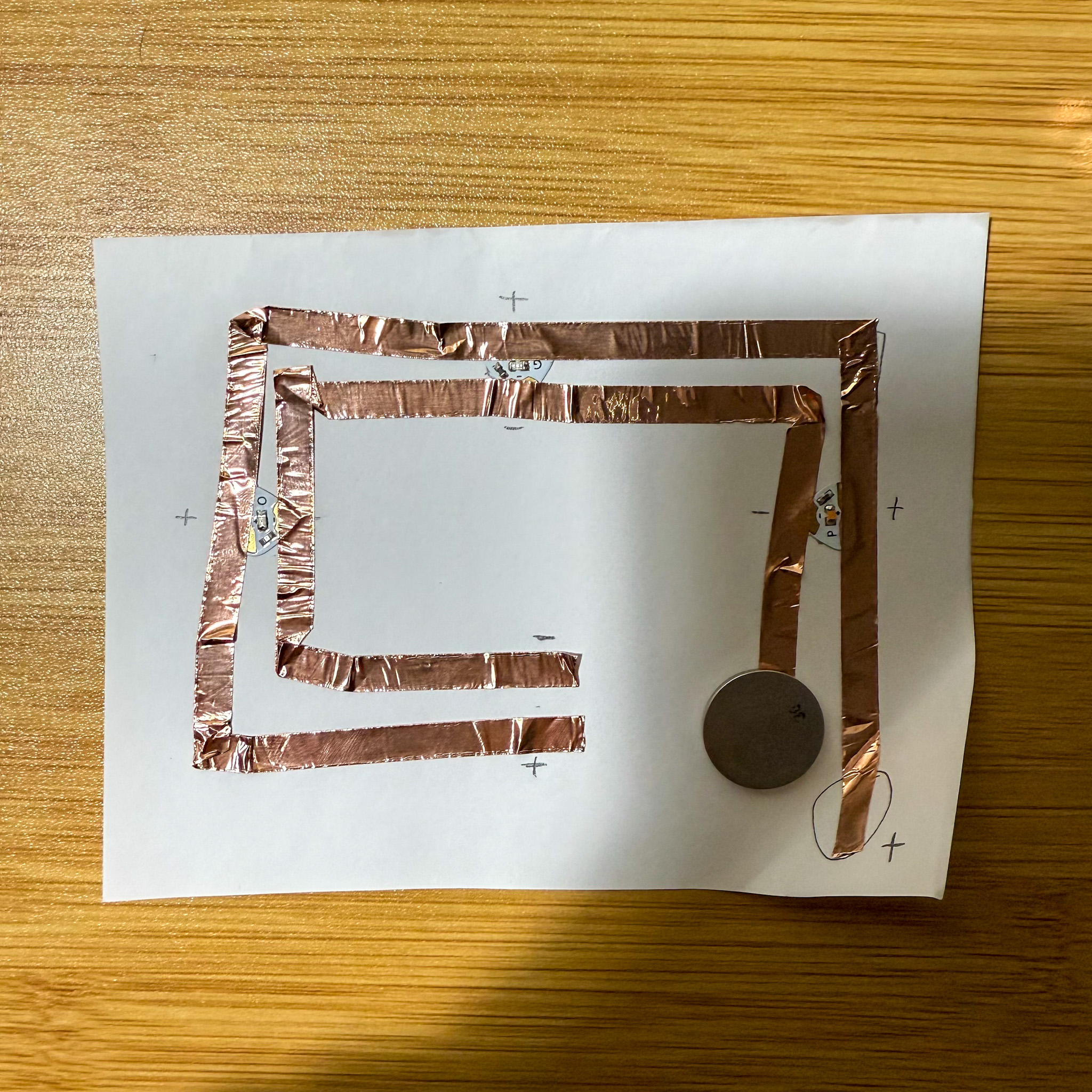 Placing the battery in the correct positive and negative position and ready to test.